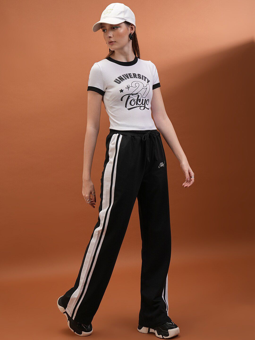 Tokyo Talkies Women Black Flared-Fit Mid Rise Track Pants