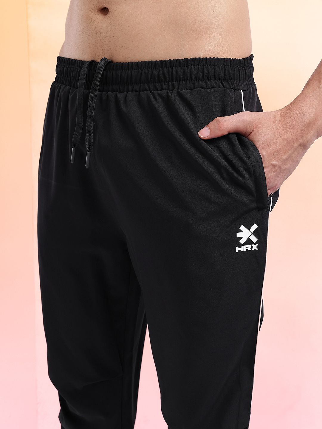 HRX by Hrithik Roshan Men Mid-Rise Rapid-Dry Training Track Pants with Side Slits