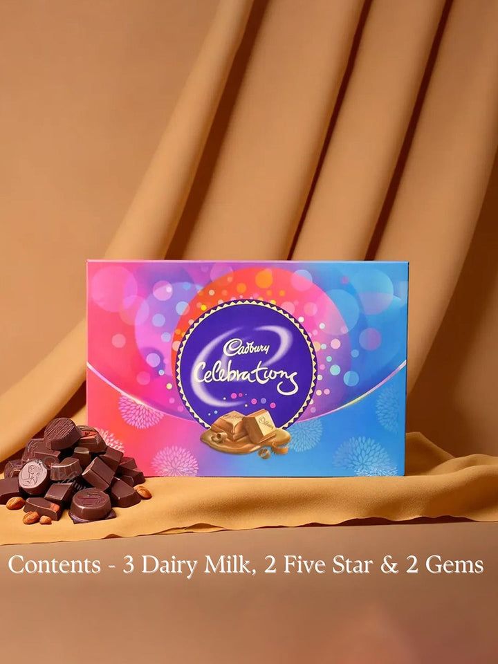 eCraftIndia Set of 4 Shrinathji, Peacock, Ganesha, Kalash Rakhis and Cadbury Celebrations
