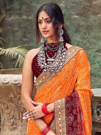 Saree mall Orange & Mauve Bandhani Printed Zari Pure Georgette Saree