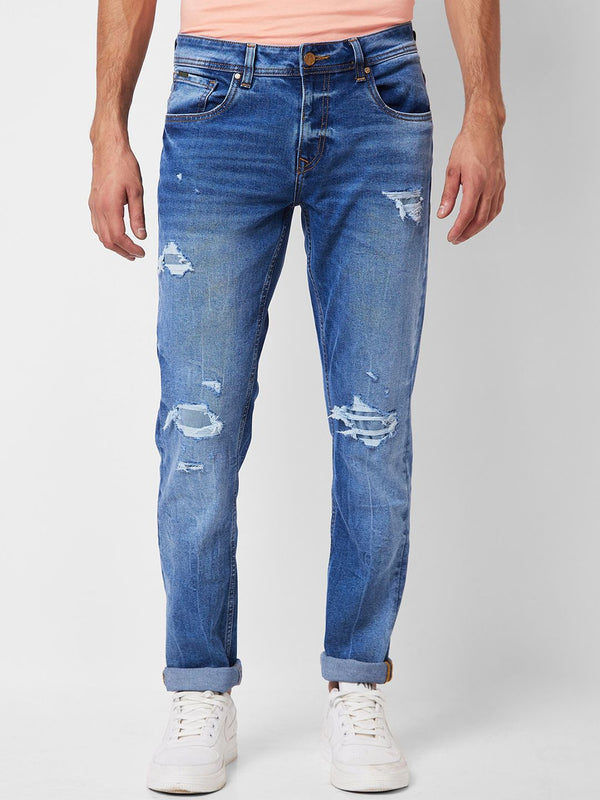 Spykar Men Slim sesuai dengan jeans berat pudar yang agak tertekan dengan rendah
