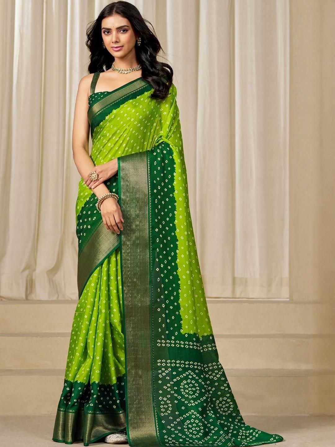 Kalini Women Dola Silk Bandhani Print Zari border Saree