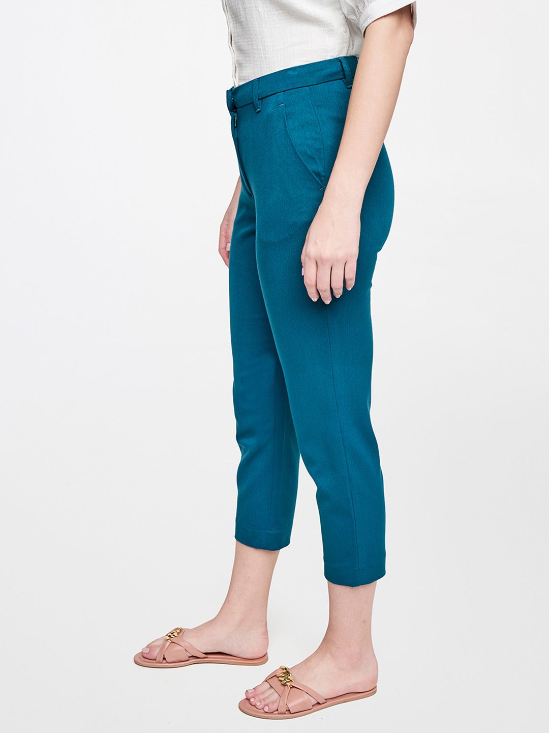 AND Women Teal Solid Casual Tapered Fit Trousers