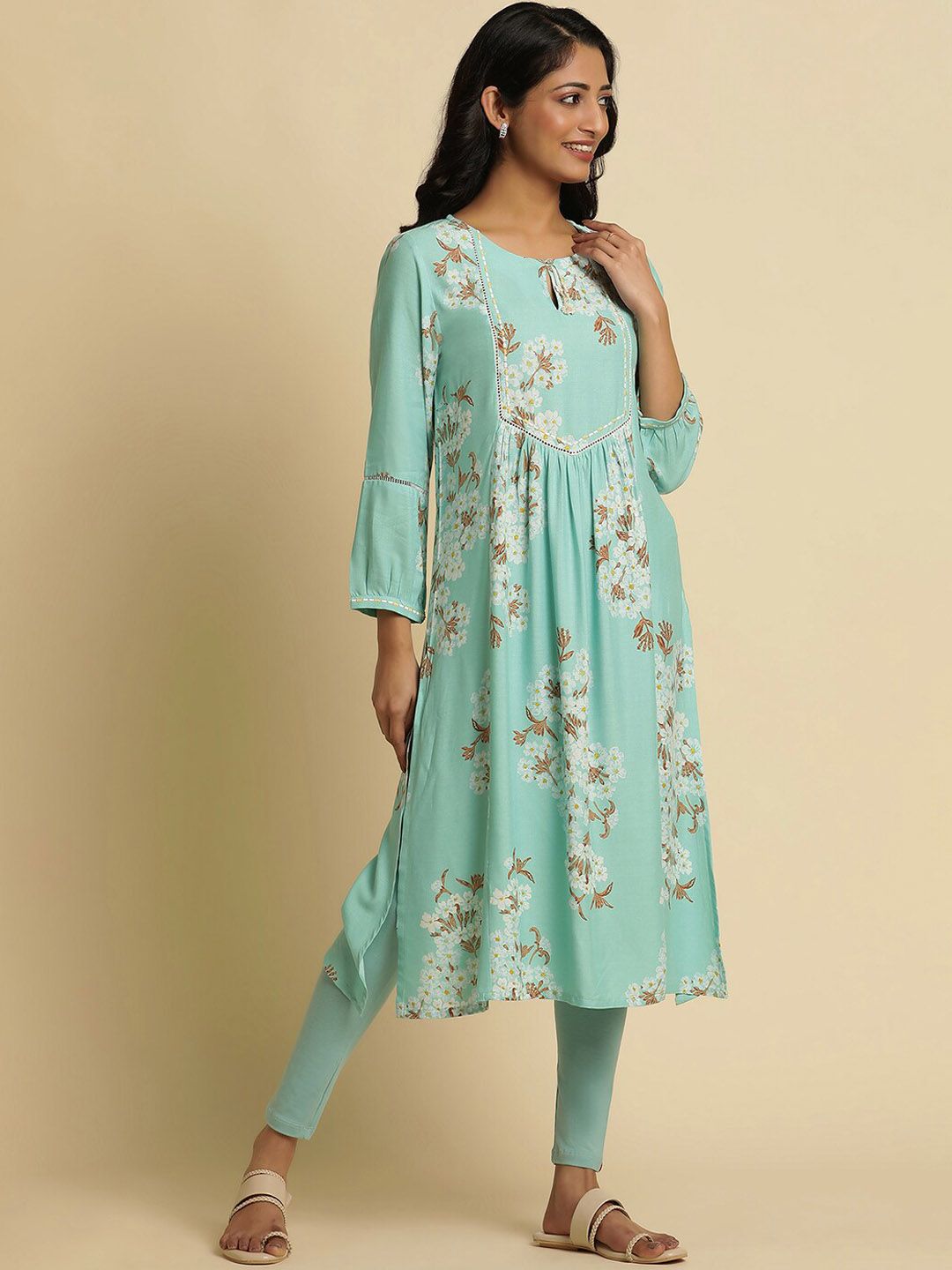 W Blue Floral Printed Keyhole Neck Thread Work Empire A-Line Kurta