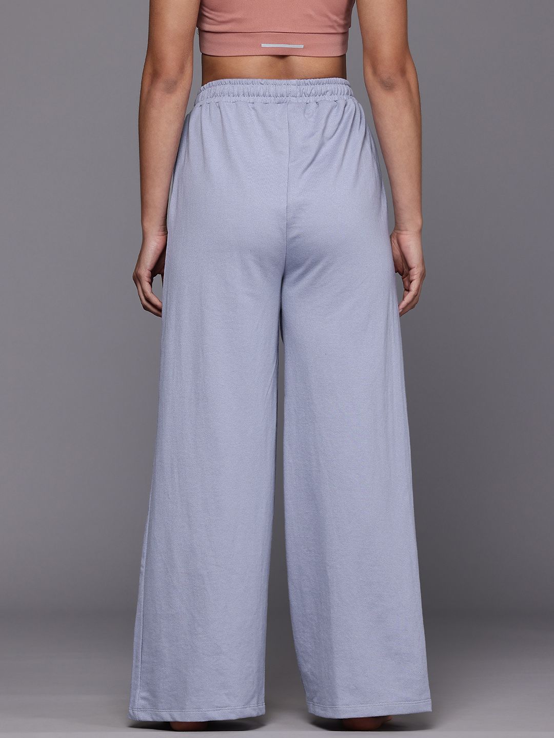 HRX by Hrithik Roshan Women Solid Piping Detailed Yoga Trackpants