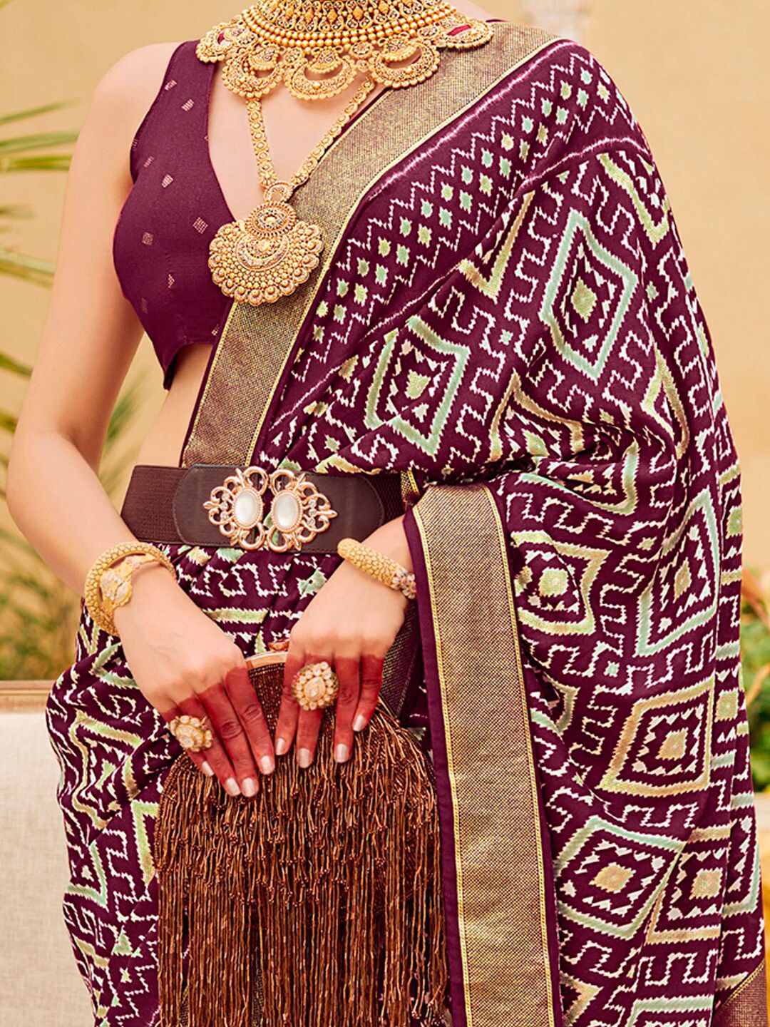Saree mall Ethnic Motifs Printed Ikat Sarees with Tassels