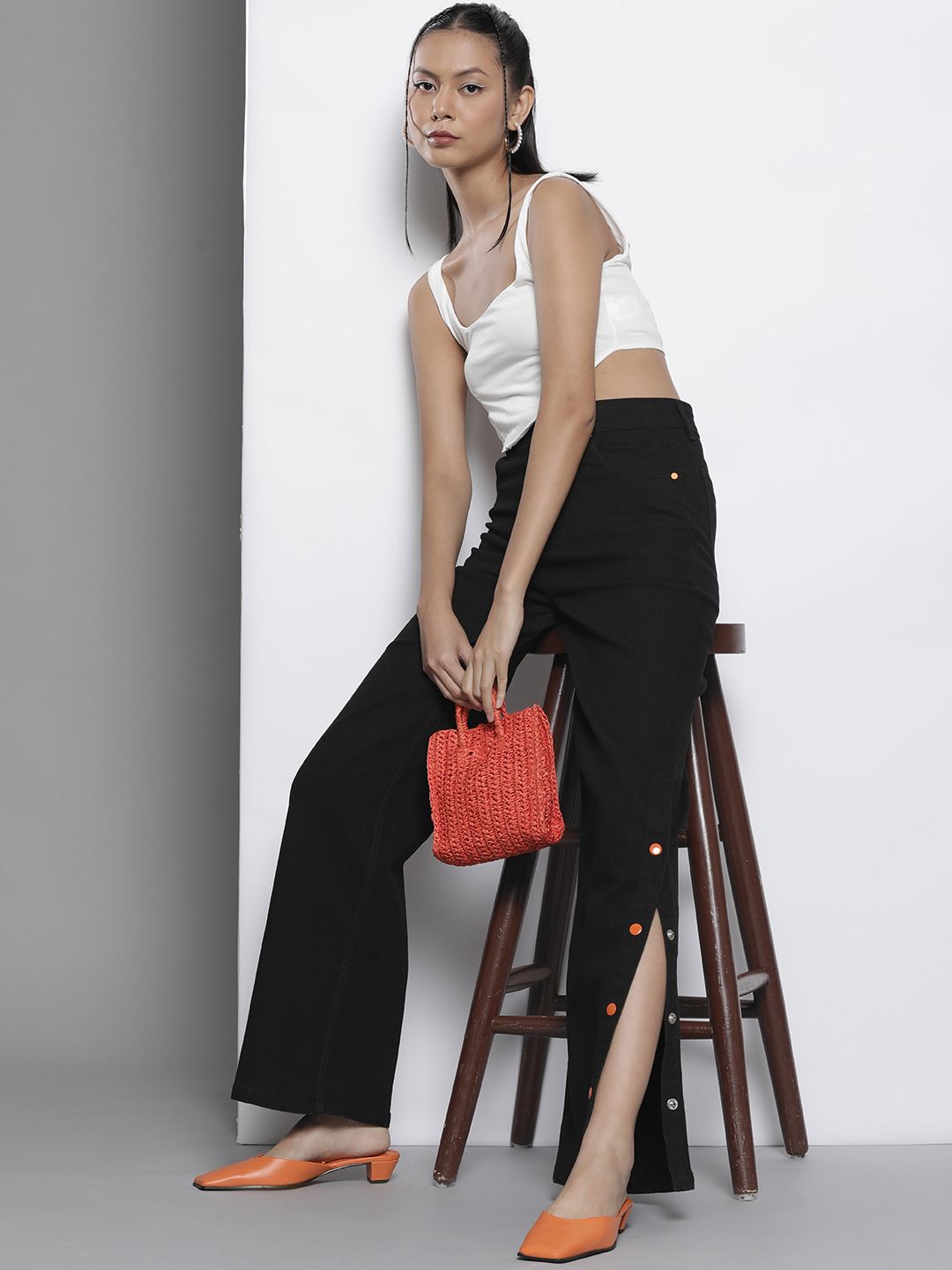 SASSAFRAS Women Black Comfort Straight Fit High-Rise Side Slit Stretchable Jeans