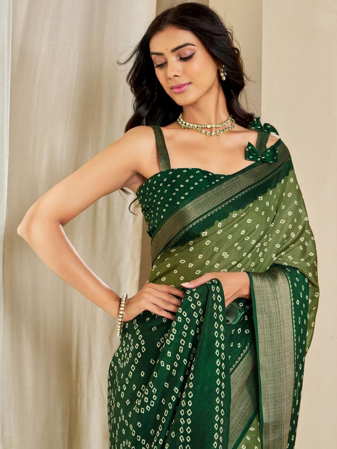 Kalini Women Dola Silk Bandhani Print Zari border Saree