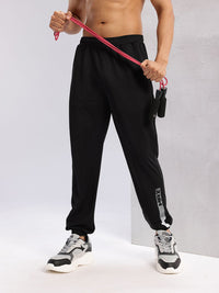 HRX oleh Hrithik Roshan Men Brand Logo Cetak Perincian Mid-Rise Rapid-Dry Joggers
