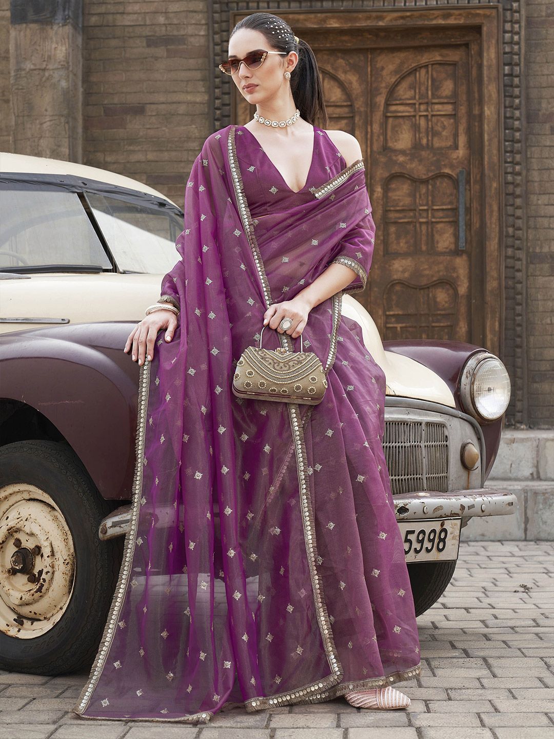 Tikhi Imli Ethnic Motifs Sequinned Net Saree