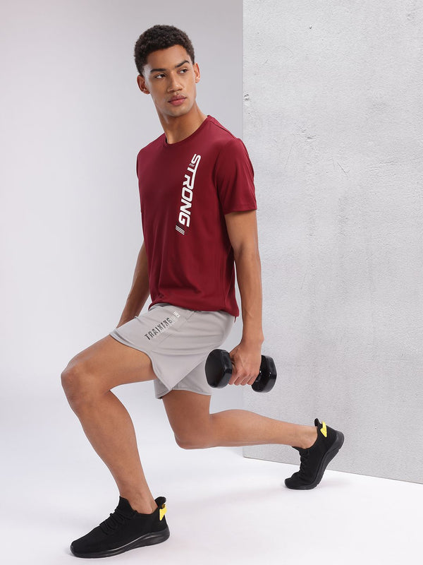 HRX oleh Hrithik Roshan mencetak t-shirt latihan cepat kering