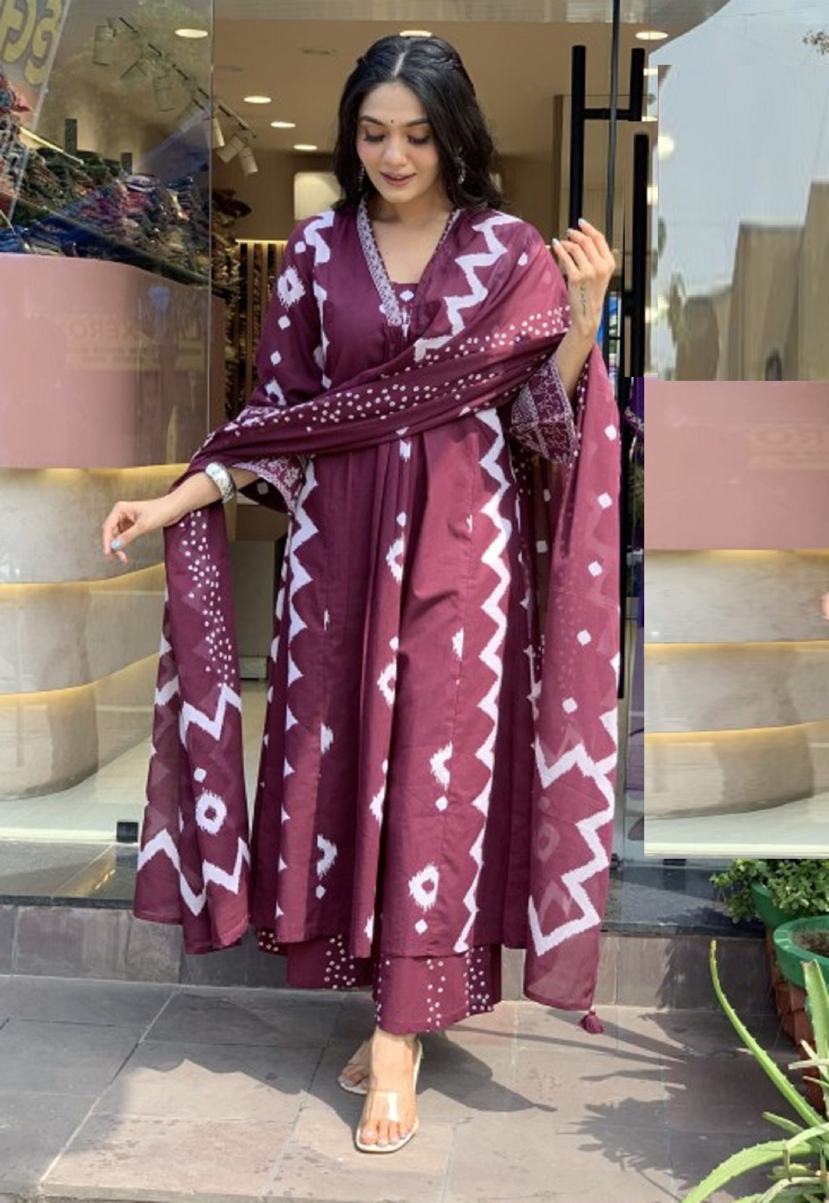 KALINI Geometric Printed Notch Neck Pleated A-Line Kurta With Trouser And Dupatta