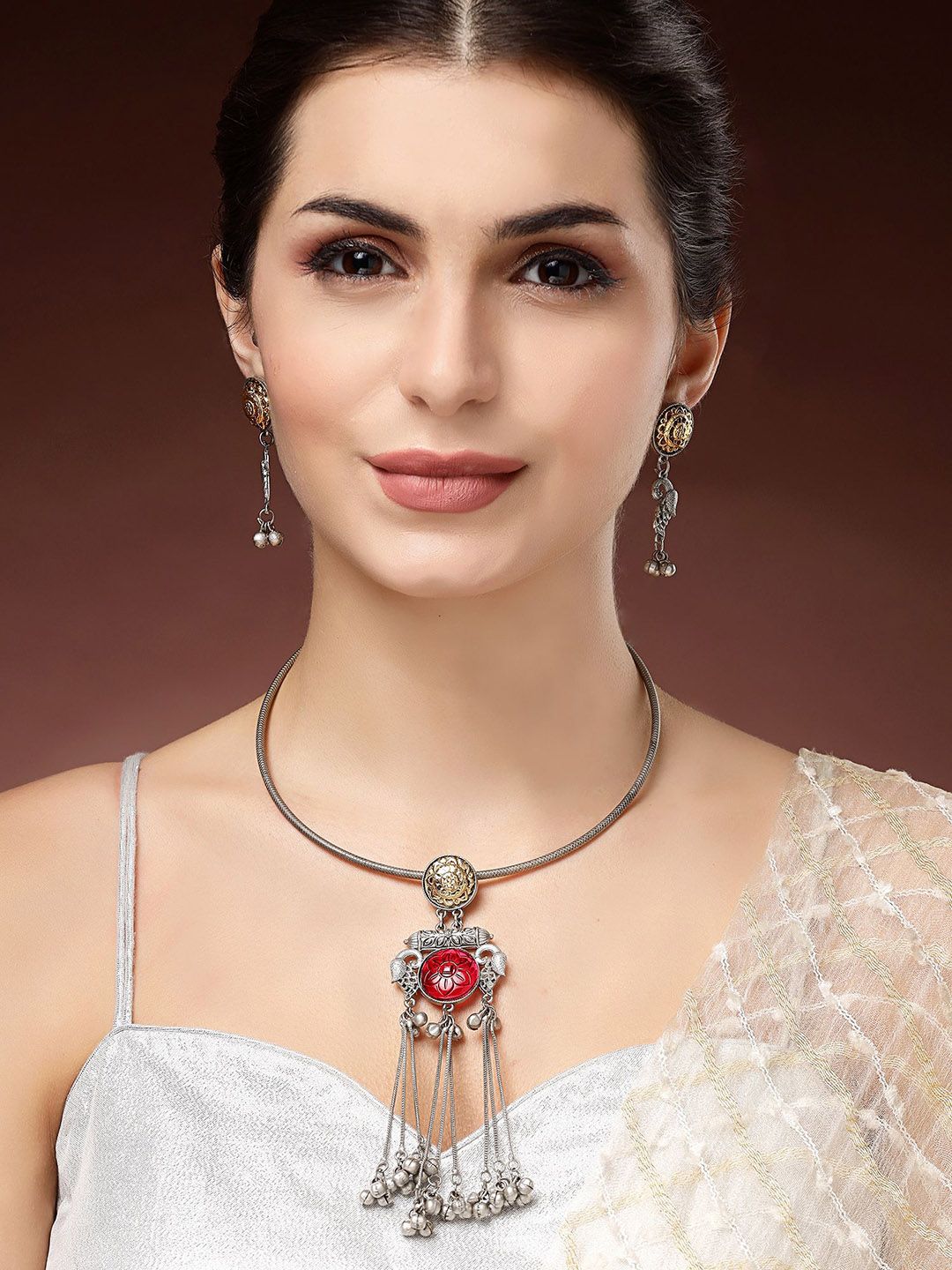 KARATCART Silver-Plated Red Stones Studded Oxidised Peacock Design Hasli Jewellery Set