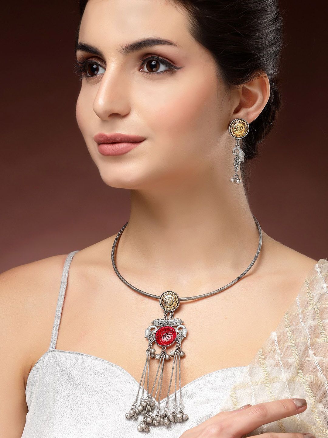 KARATCART Silver-Plated Red Stones Studded Oxidised Peacock Design Hasli Jewellery Set