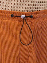 The Indian Garage Co Men Textured Tapered Fit Pleated Joggers