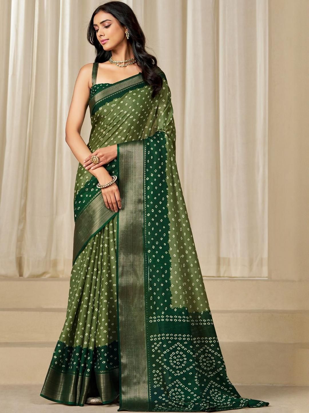 Kalini Women Dola Silk Bandhani Print Zari border Saree