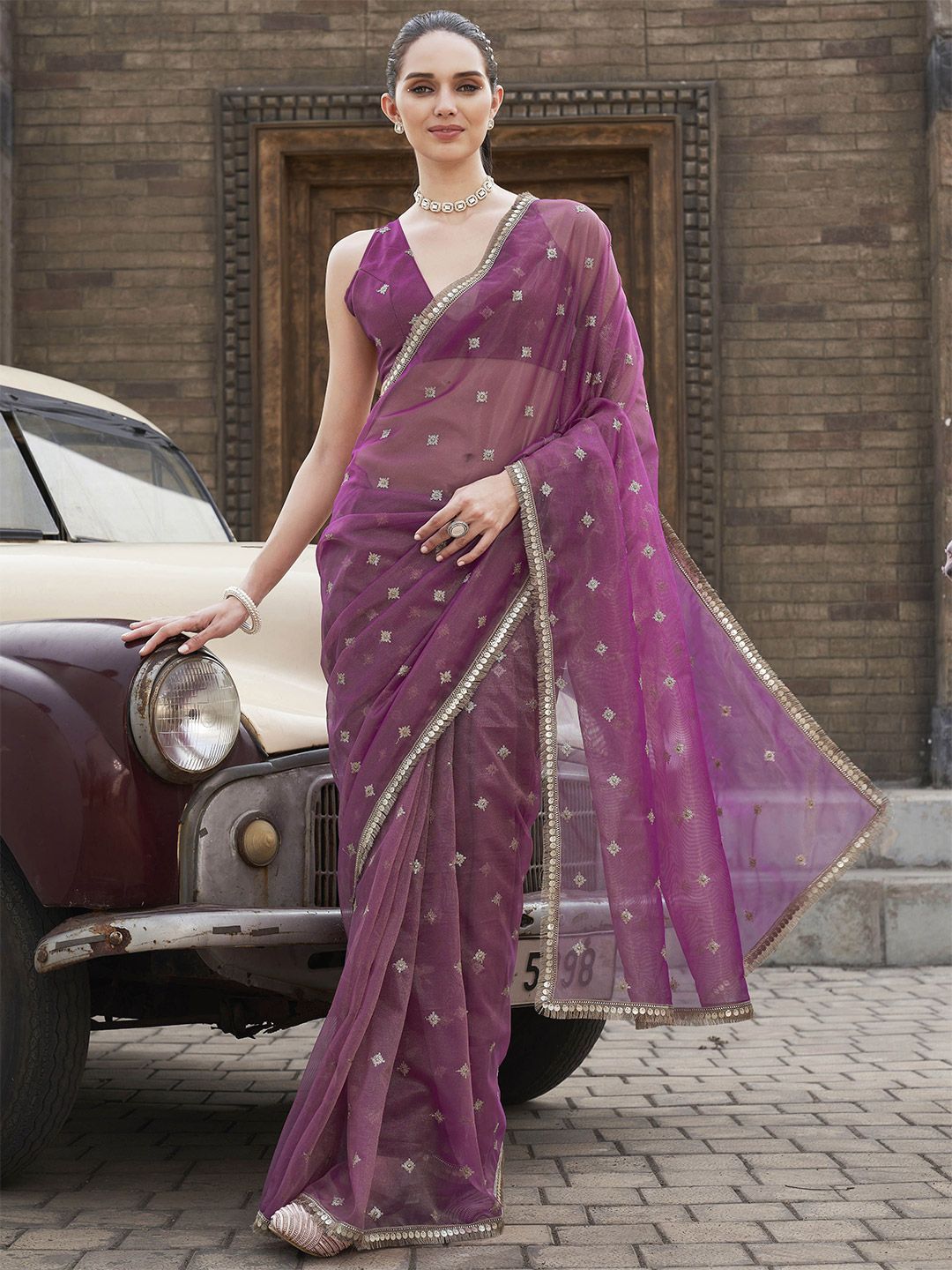 Tikhi Imli Ethnic Motifs Sequinned Net Saree