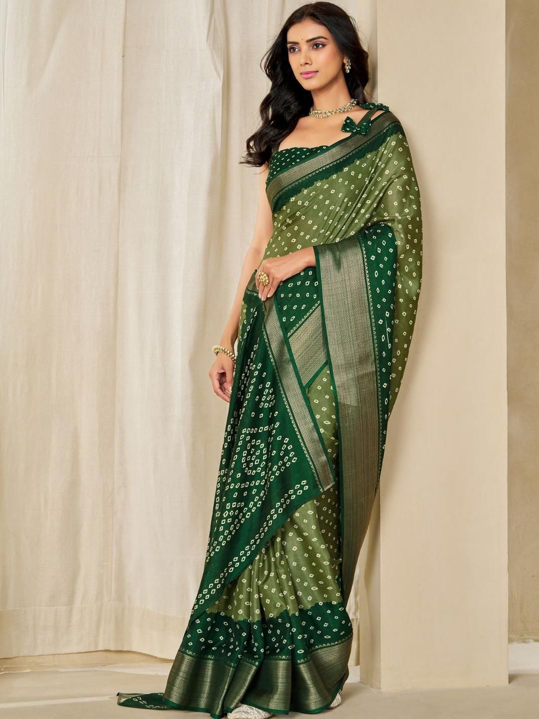 Kalini Women Dola Silk Bandhani Print Zari border Saree