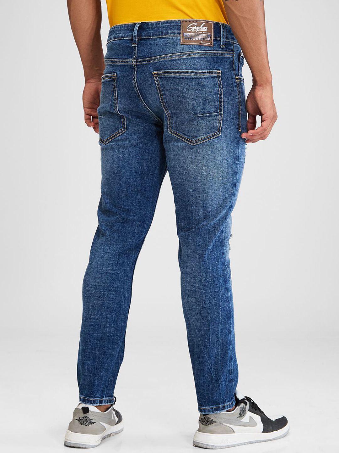 SPYKAR Men Slim Fit Mildly Distressed Light Fade Stretchable Jeans