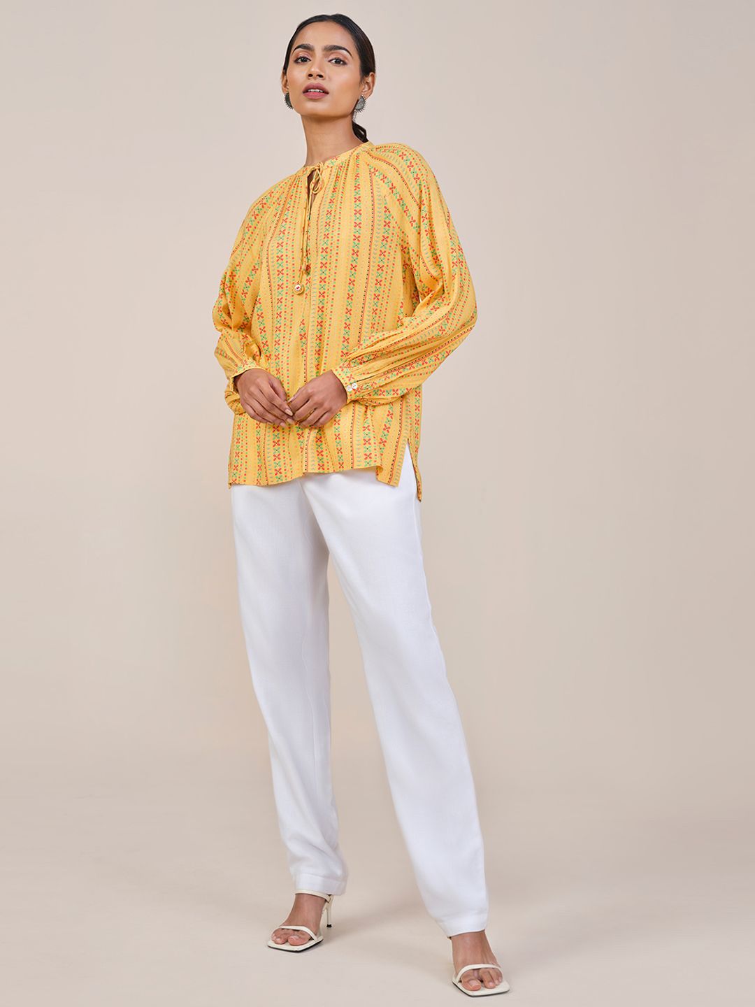 Global Desi Women Mustard Viscose Rayon Print Tie-Up Neck long Sleeves Top