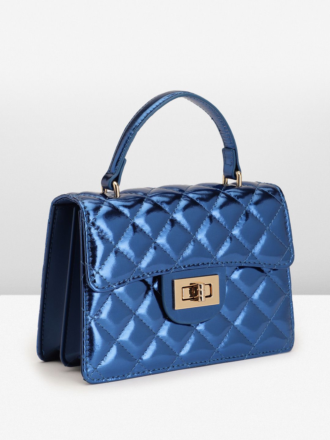 Lino Perros Quilted Structured Handheld Bag