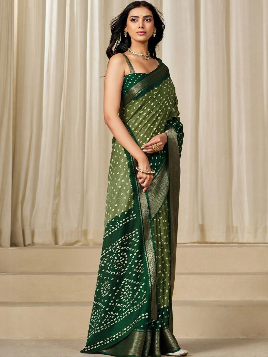 Kalini Women Dola Silk Bandhani Print Zari border Saree