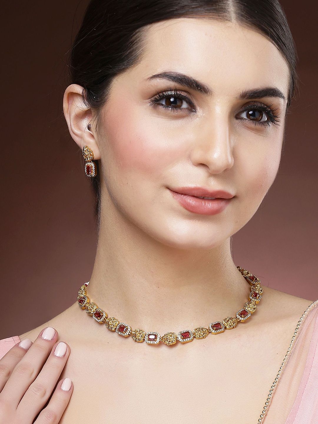KARATCART Gold Plated Stone Studded Laxmi Mata Temple Necklace and Earrings