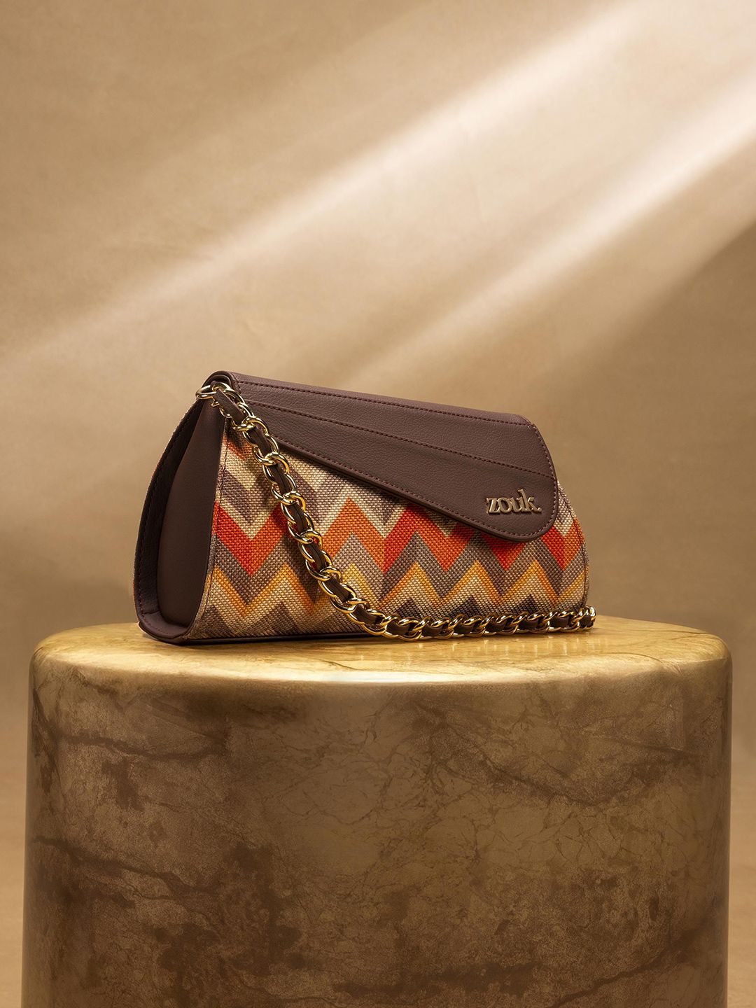 ZOUK Printed Structured Sling Bag with Tasselled