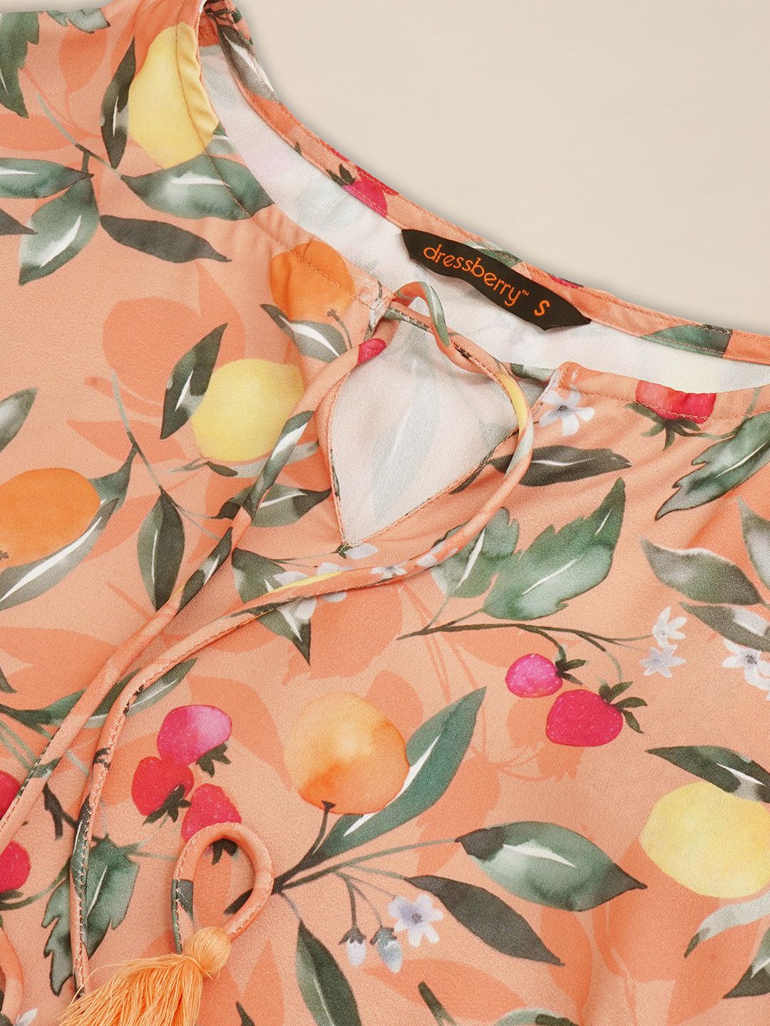 DressBerry Floral Printed Tie-Up Neck Bell Sleeve Peplum Top