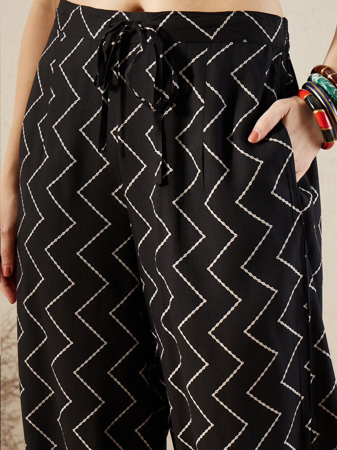 Indo Era Black Floral Printed V-Neck Sequinned A-Line Kurta With Salwar