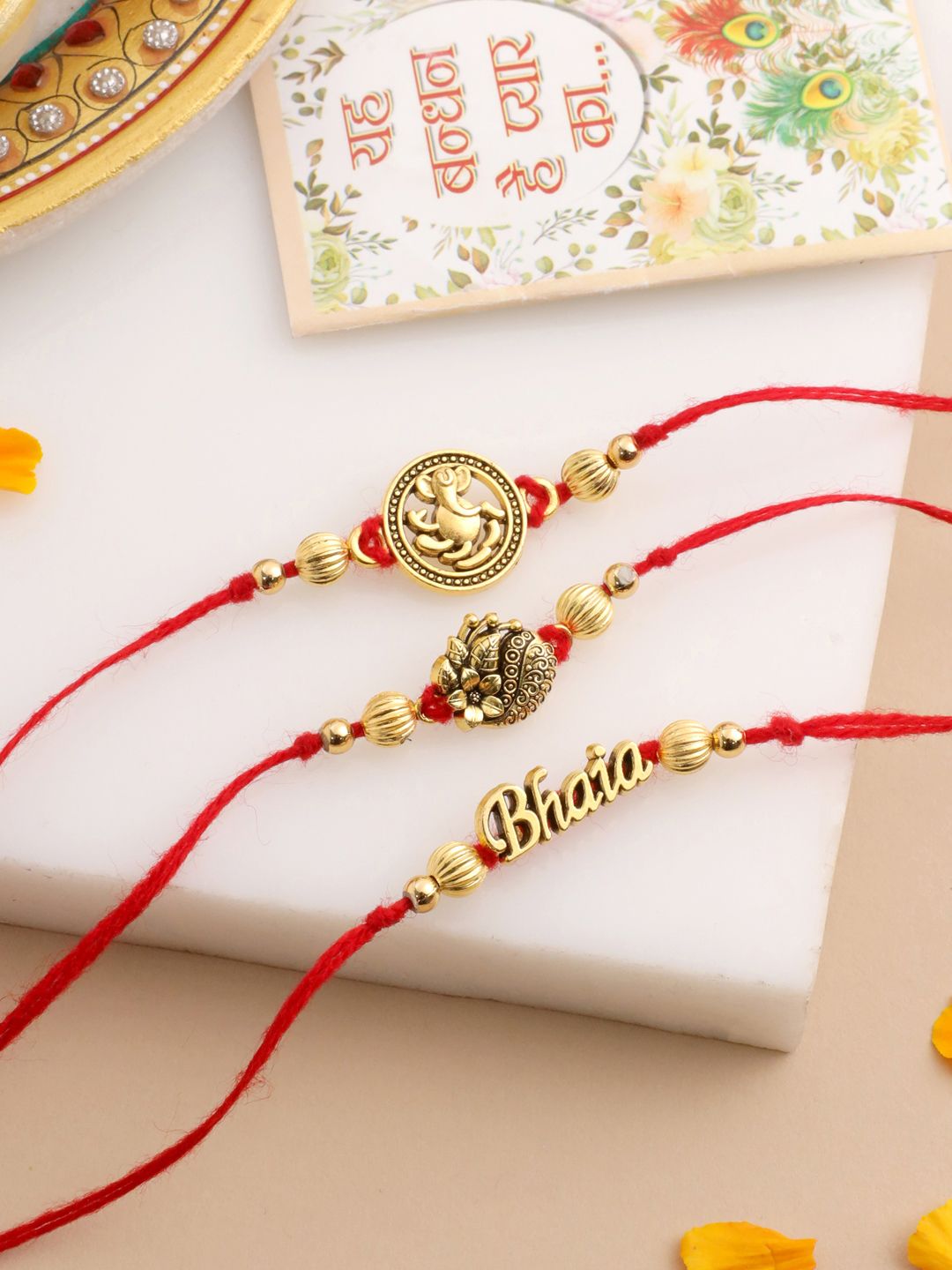 NVR Unisex Set of 3 Gold Toned Thread Rakhi with Roli Chawal Chandan Mishri
