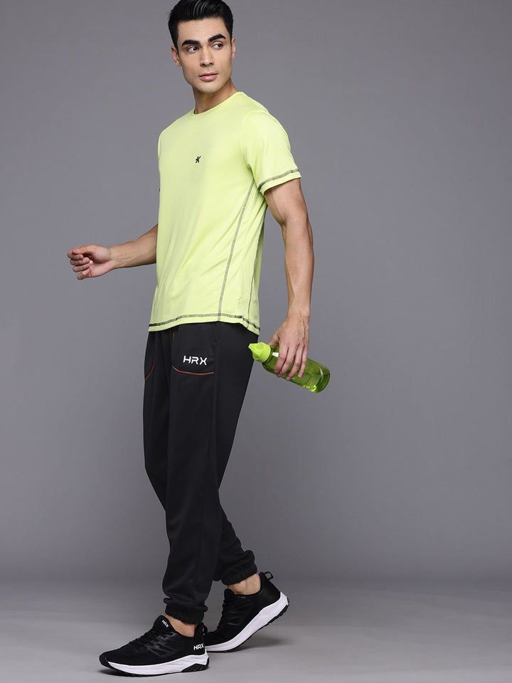 HRX by Hrithik Roshan Men Brand Logo Printed Detail Mid-Rise Rapid-Dry Training Joggers