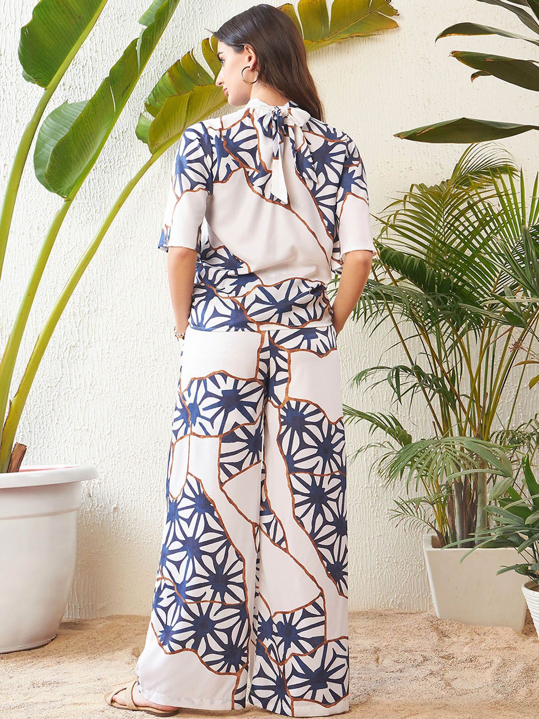 SASSAFRAS White Abstract Printed High Neck Top With Palazzos