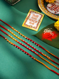 NVR Unisex Set of 4 Pearls Traditional Red Thread Rakhi With Roli Chawal