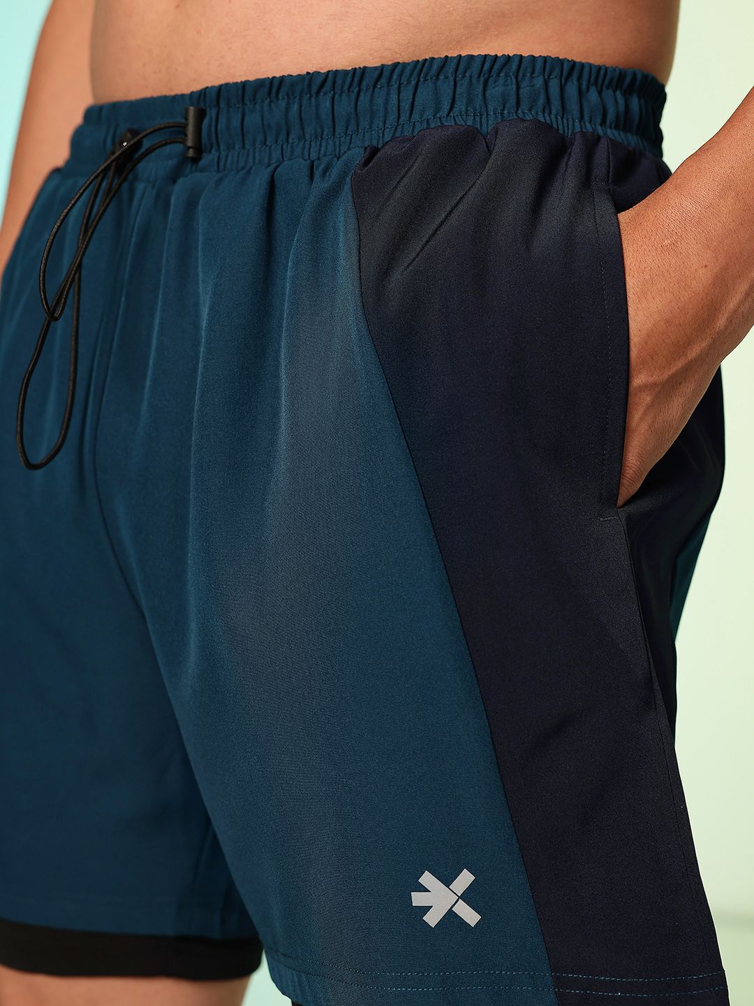 HRX by Hrithik Roshan Men Colourblocked Running Shorts with Inner Attached Tights