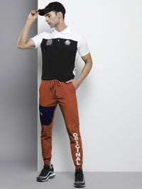 The Indian Garage Co Men Rust Orange Colourblocked Slim Fit Pleated Joggers Trousers