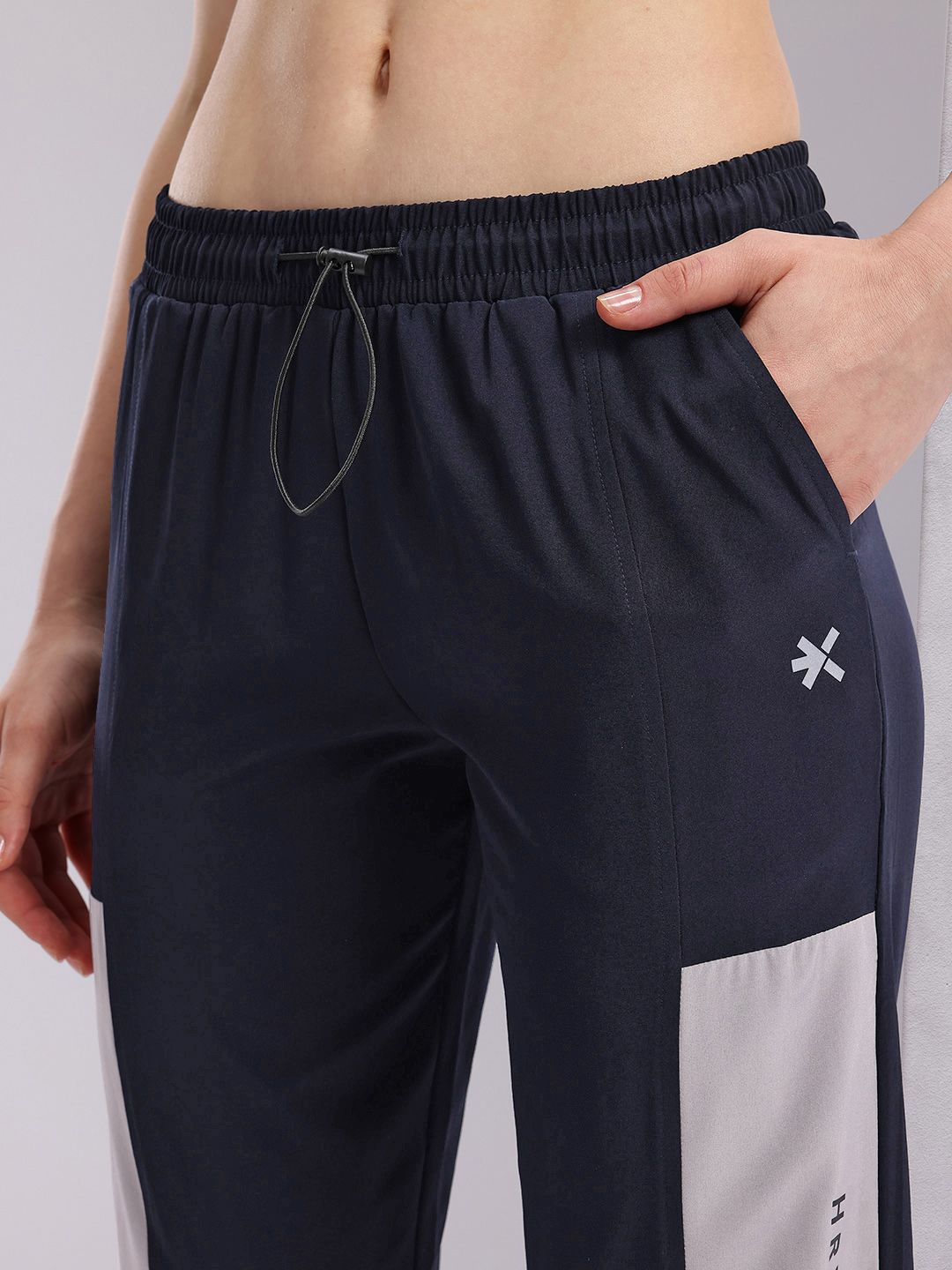 HRX by Hrithik Roshan Women Colourblocked Cropped Running Track Pants with Zip Detail