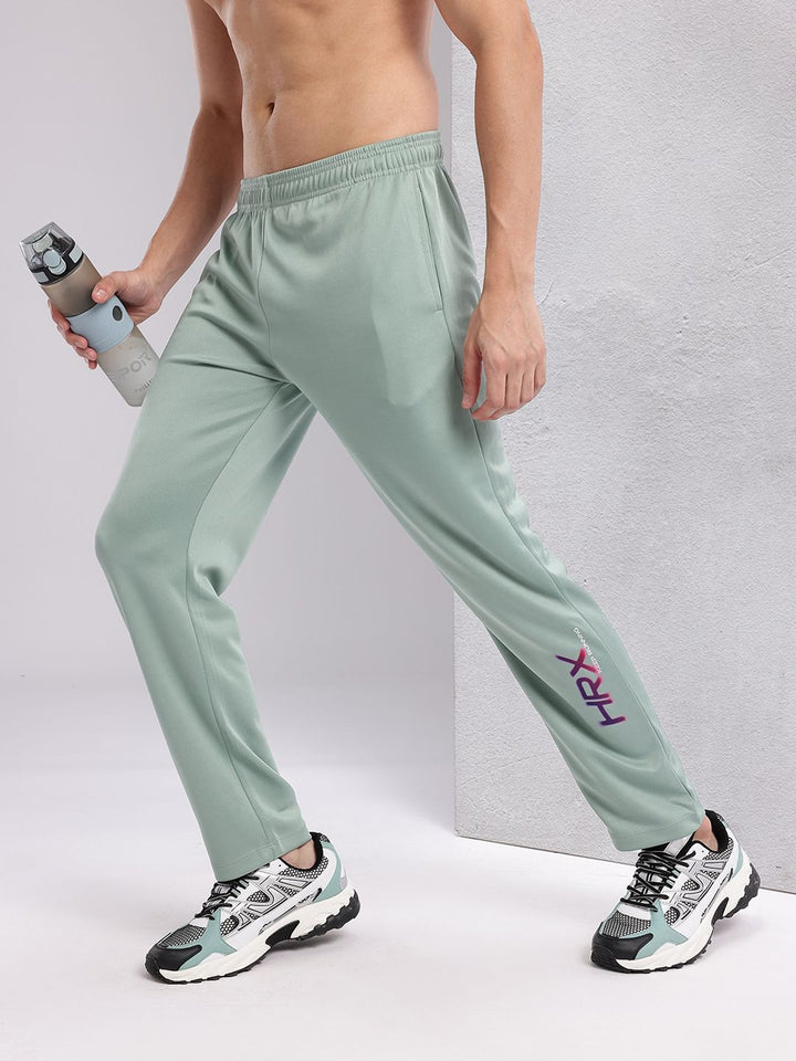 HRX by Hrithik Roshan Men Brand Logo Printed Mid-Rise Rapid-Dry Running Track Pants