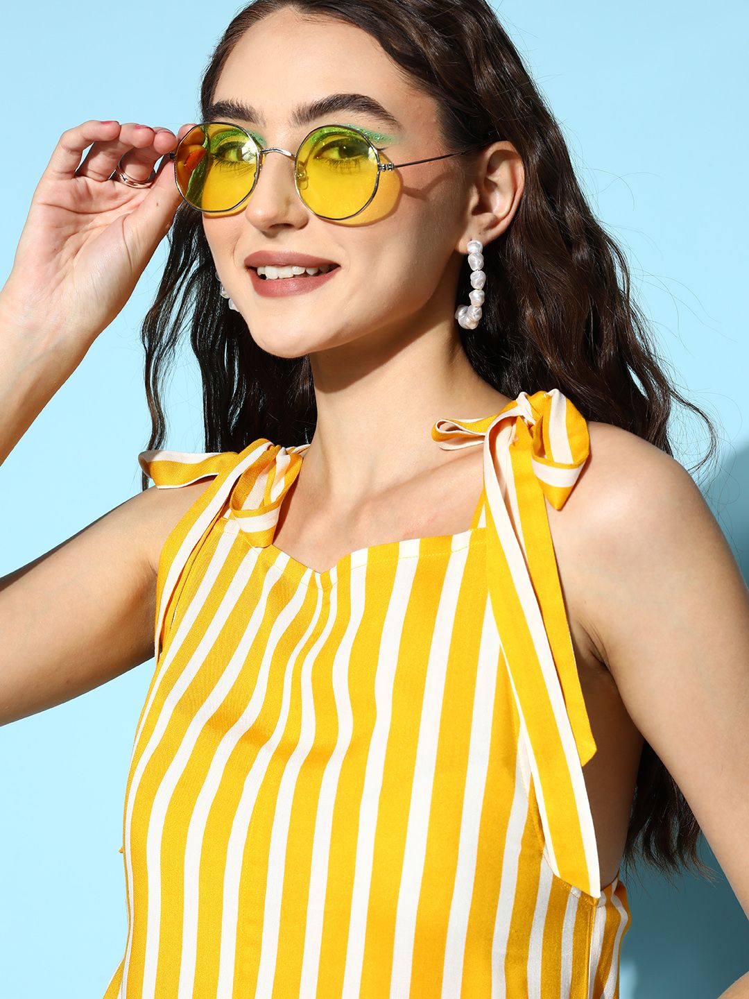 Berrylush Women Attractive Yellow Striped Fluid Tie-Up Jumpsuit
