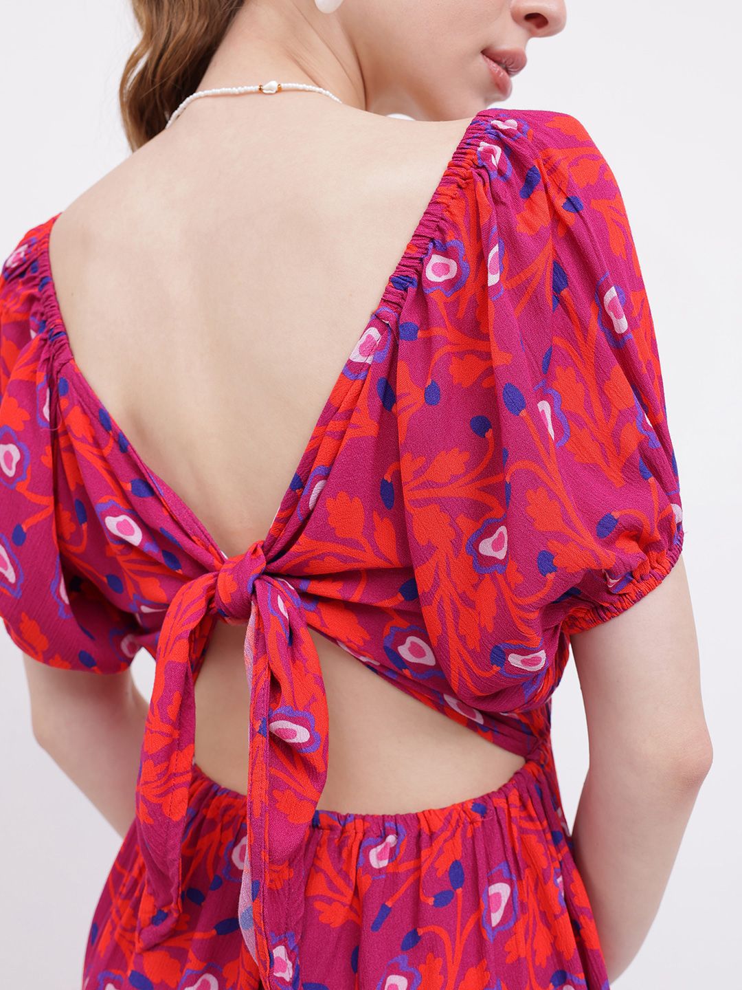 DressBerry Romantic & Flirty Printed Cut-Out Tie-Up Playsuit