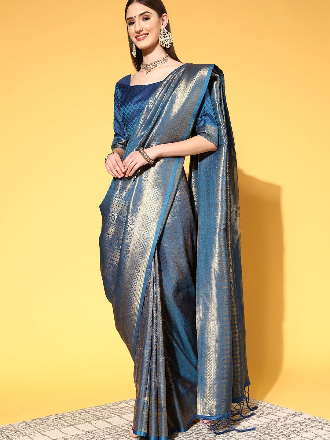 Saree mall Blue & Golden Ethnic Motifs Silk Blend Sarees