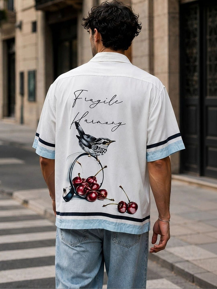 Baju Lengan Pendek Kapas Grafik Fragile Bird Eszett