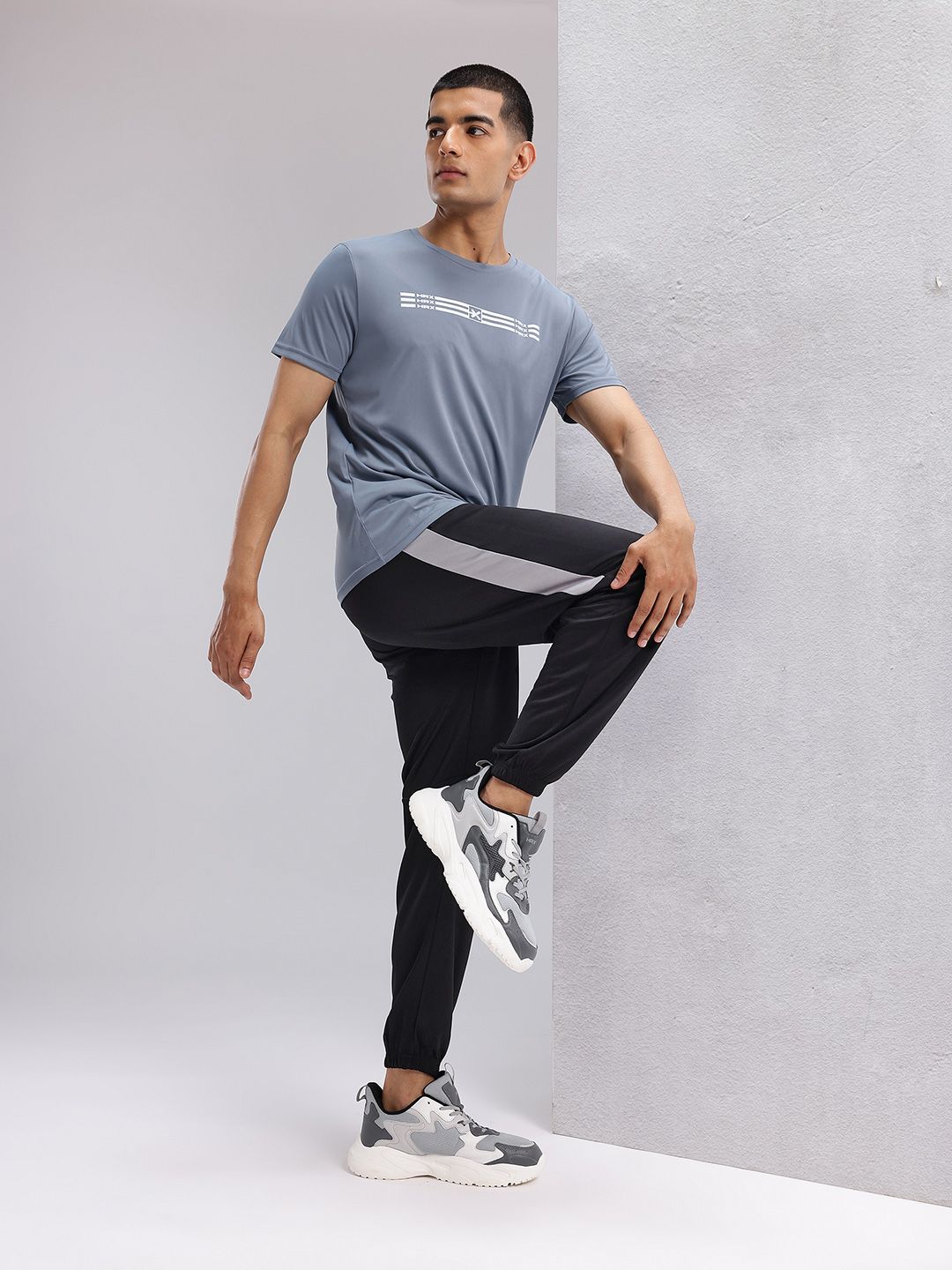 HRX by Hrithik Roshan Men Brand Logo Printed Mid-Rise Rapid-Dry Running Joggers