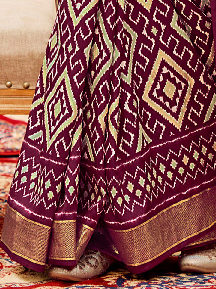 Saree mall Ethnic Motifs Printed Ikat Sarees with Tassels