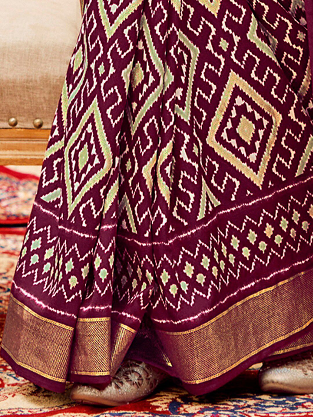 Saree mall Ethnic Motifs Printed Ikat Sarees with Tassels