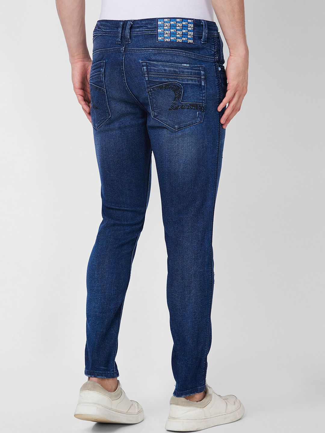 SPYKAR Men Tapered Fit Mildly Distressed Heavy Fade Cotton Stretchable Jeans