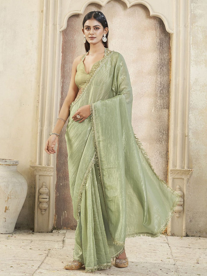 Tikhi Imli Solid Embroidered Saree