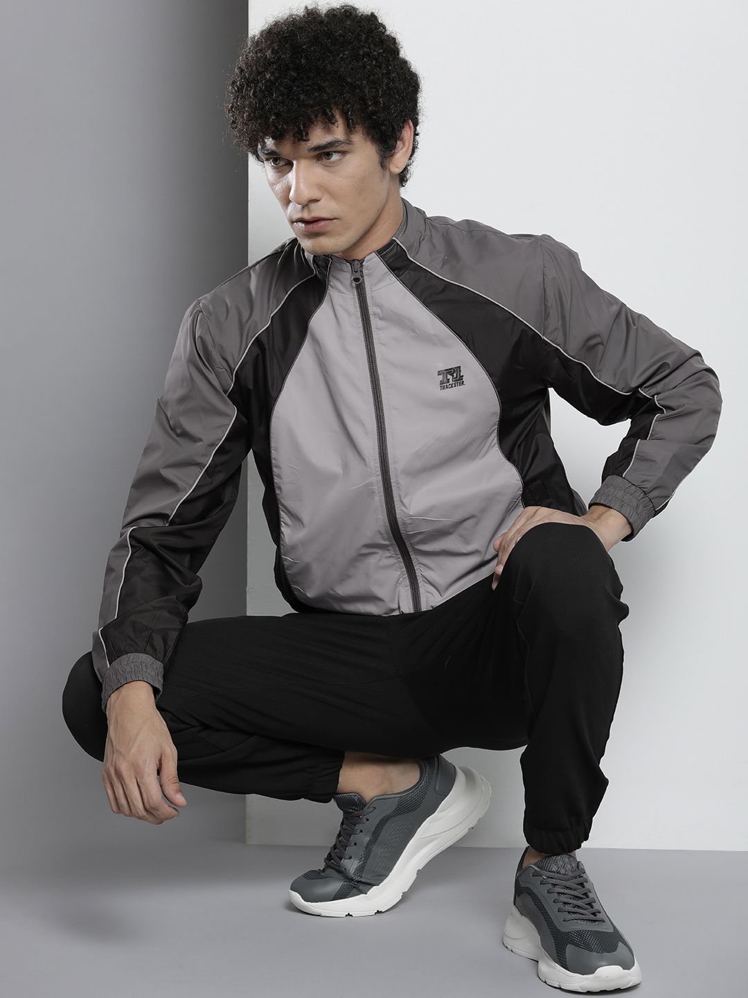 The Indian Garage Co Men Grey & Black Colourblocked Windcheater Jacket