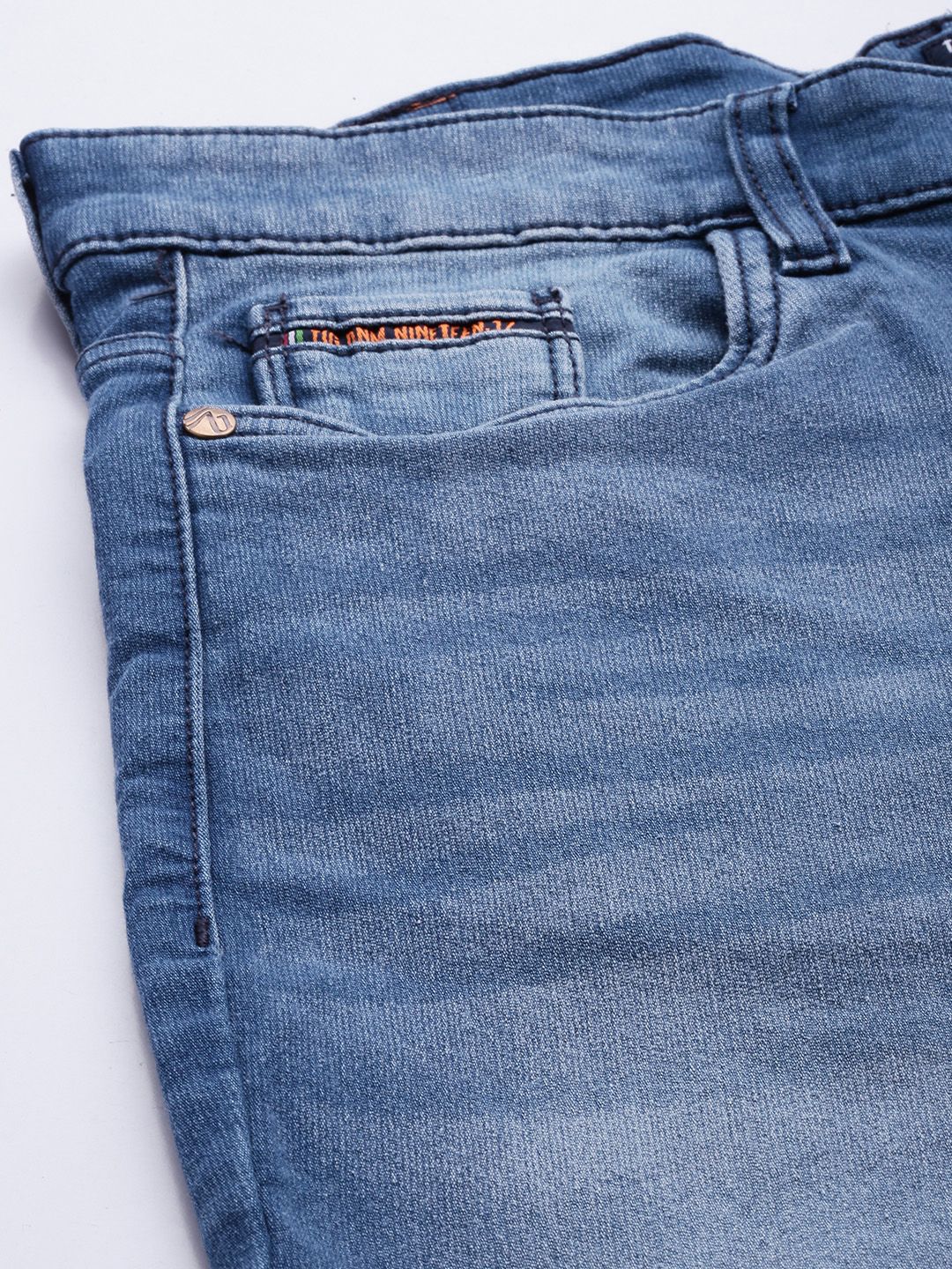 The Indian Garage Co Men Blue Slim Fit Mildly Distressed Light Fade Stretchable Jeans