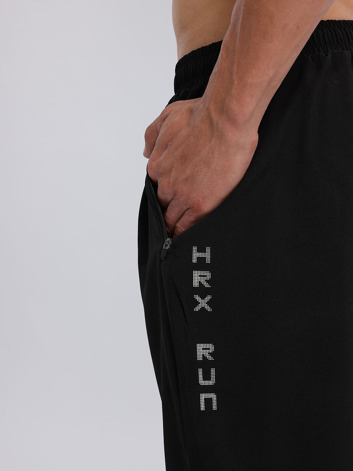 HRX oleh Hrithik Roshan Men Typography Print Paneled Mid Rise Rapid Running Track Seluar